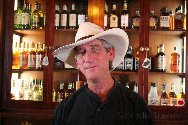 IMG_9751.JPG - Our bartender. Originally from upstate New York, he moved to Arizona to be a rancher. He now owns a home in Tombstone and his ranch an hour away. He bartends to supplement his income stating, "There's not a lot of money in ranching these days."